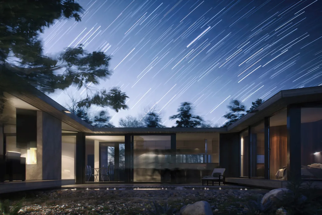 Wizualizacja architektoniczna skandynawskiego domu imitująca długi czas naświetlania, drzewa w widocznym ruchu są rozmyte, na niebie są widoczne smugi gwiazd